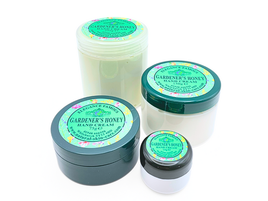 Set of Gardener's Honey hand cream jars on a white background